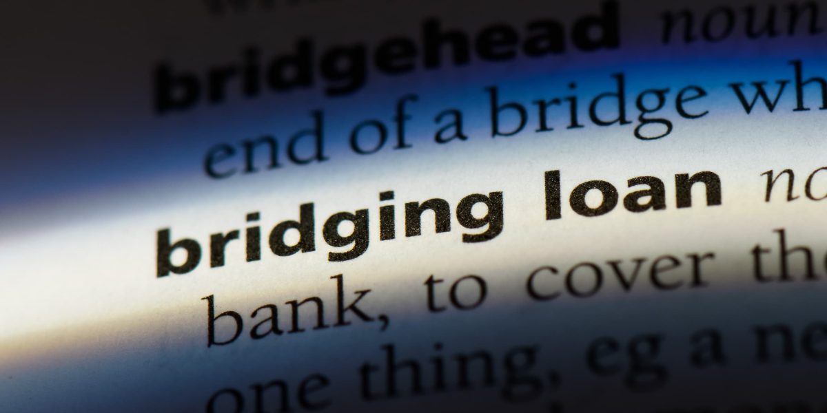 A close-up of a dictionary page, with the term ‘bridging loan’ highlighted.